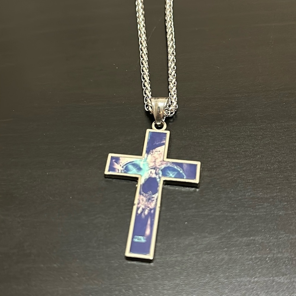 Add-on to any bundle $5. Skull cross necklace with chain.